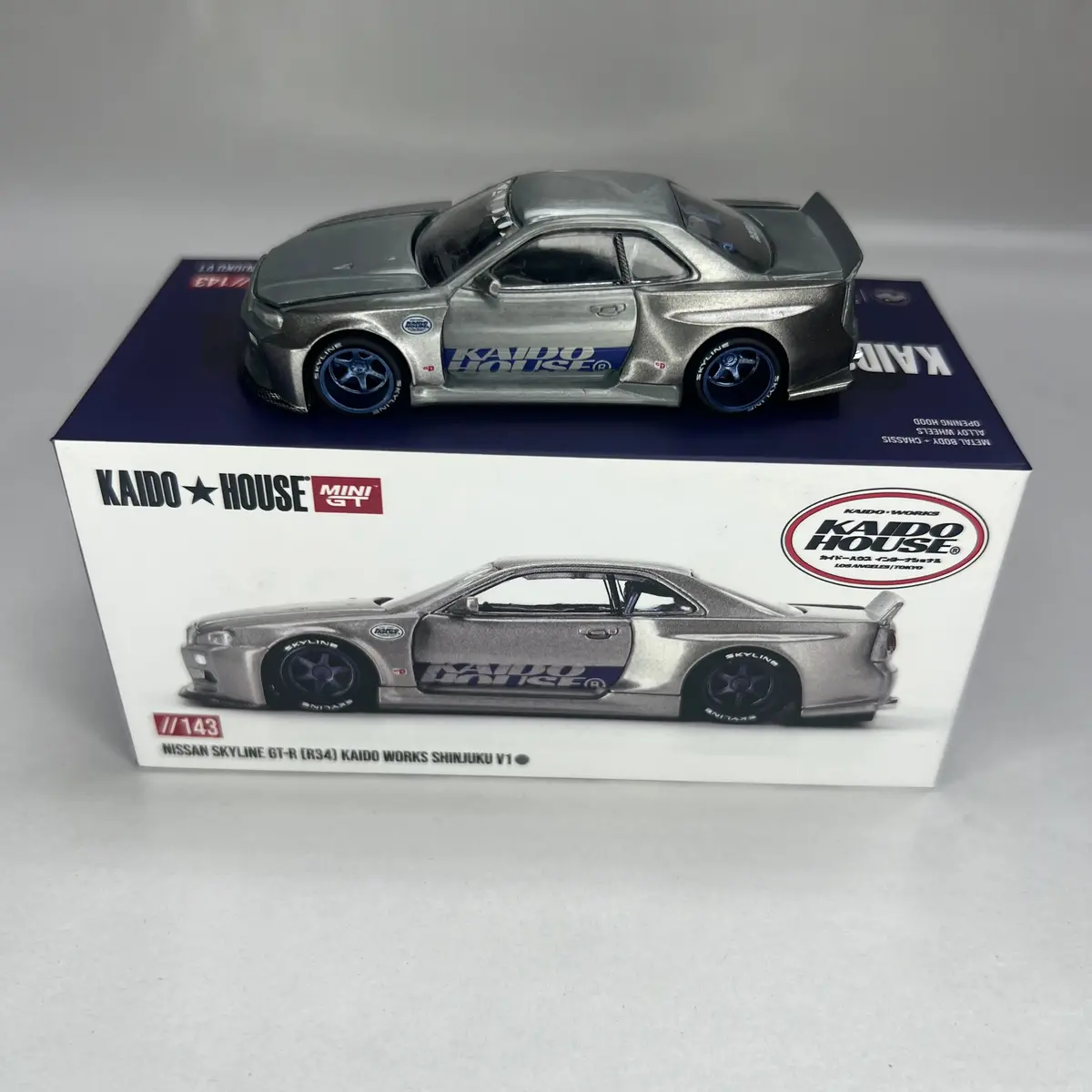 Chase Kaido House X Mini Gt 1:64 #143 Nissan Skyline Gt-R (R34) Kaido Works Shinjuku V1 1