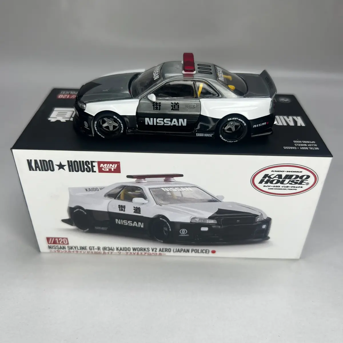 Chase Kaido House X Mini Gt 1:64 #120 Nissan Skyline Gt-R R34 Kaido Works V2 Aero Japan Police 1