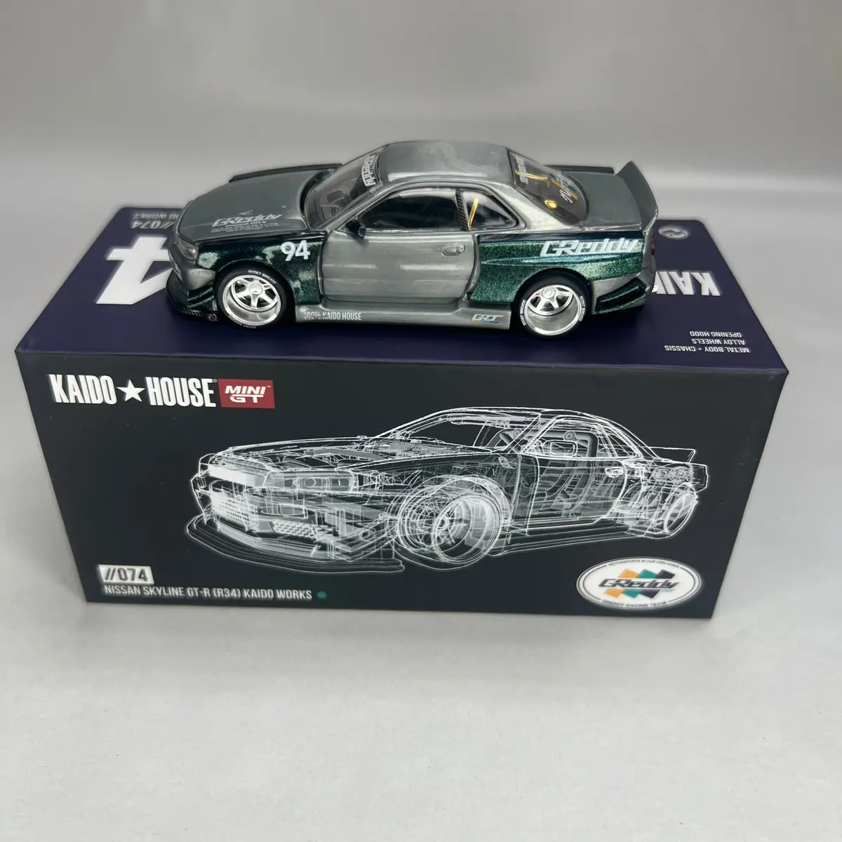 Chase Kaido House X Mini Gt 1:64 #074 Nissan Skyline Gt-R (R34) Kaido Works Greddy V1 1