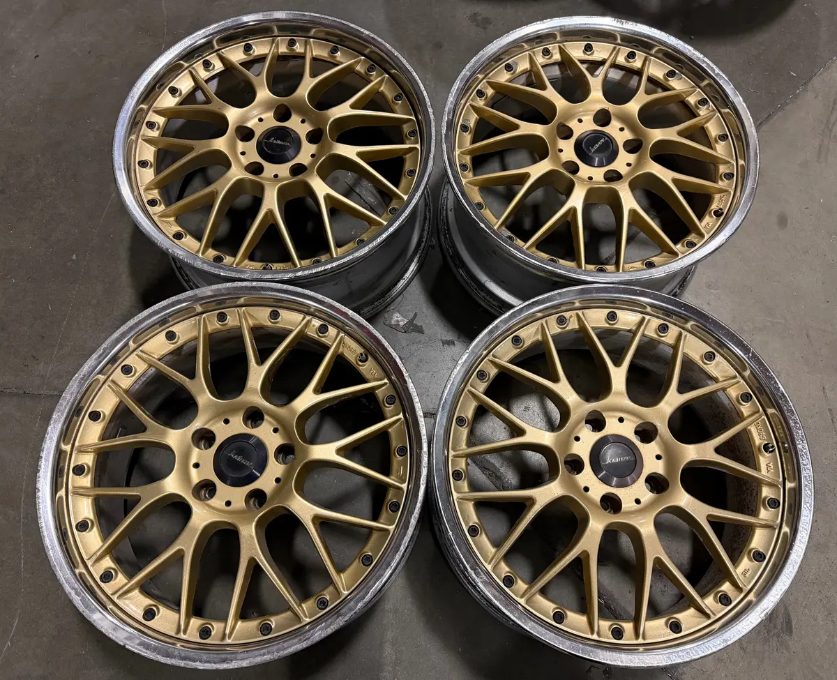 18-inch Weds ERM alloy wheels featuring a 5x114.3 bolt pattern and elegant gold finish