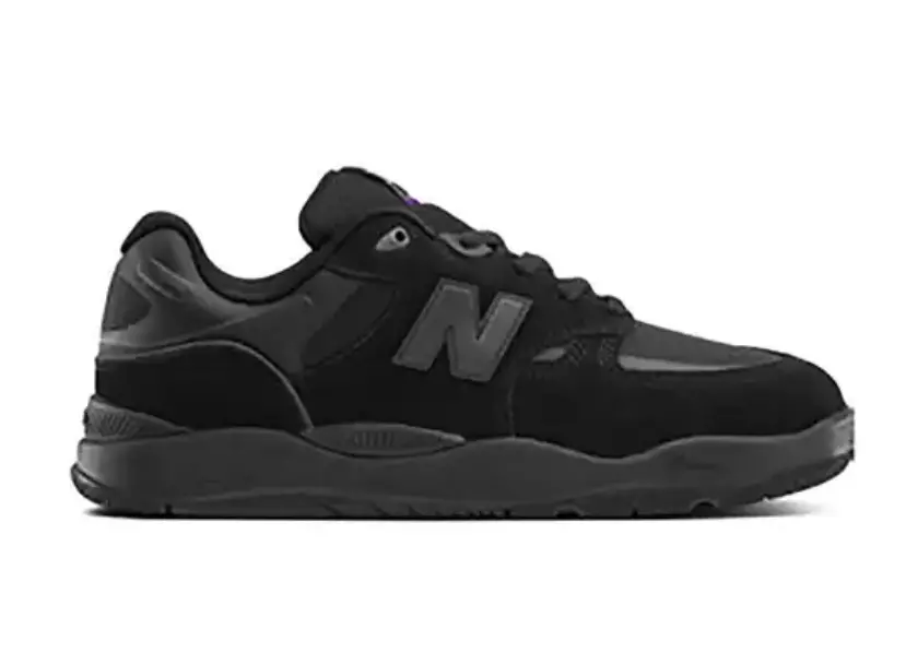 Stylish and durable New Balance Numeric Tiago 1010 skate shoes in all-black design for performance and everyday wear.