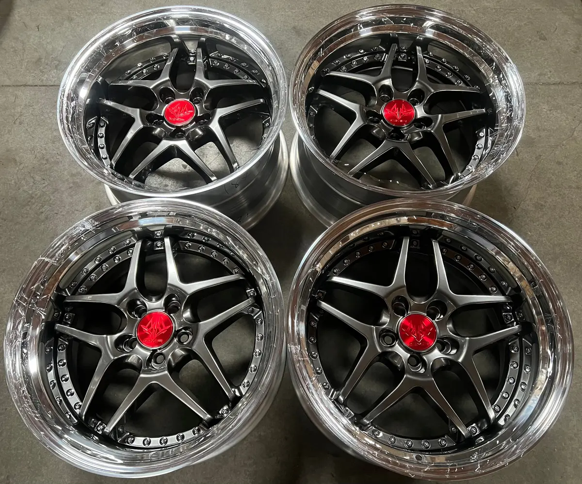 GMR Evoke 18-inch alloy wheel featuring a sleek titan black finish and a versatile 5x100 bolt pattern for precise fitment.